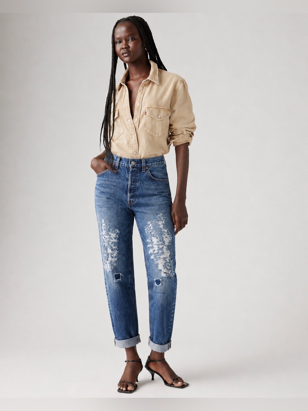 - Vintage Levi’s Distressed High Rise Jeans Cuffed